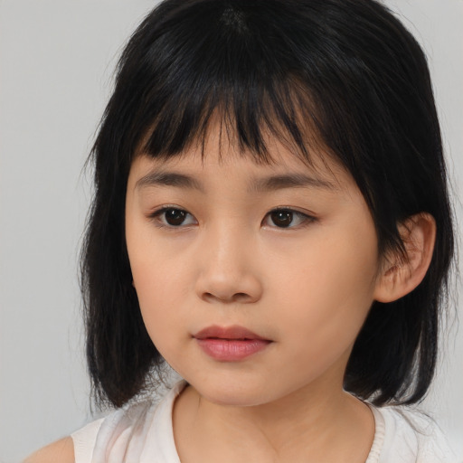 Neutral asian child female with medium  brown hair and brown eyes