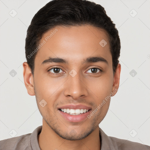 Joyful white young-adult male with short  brown hair and brown eyes