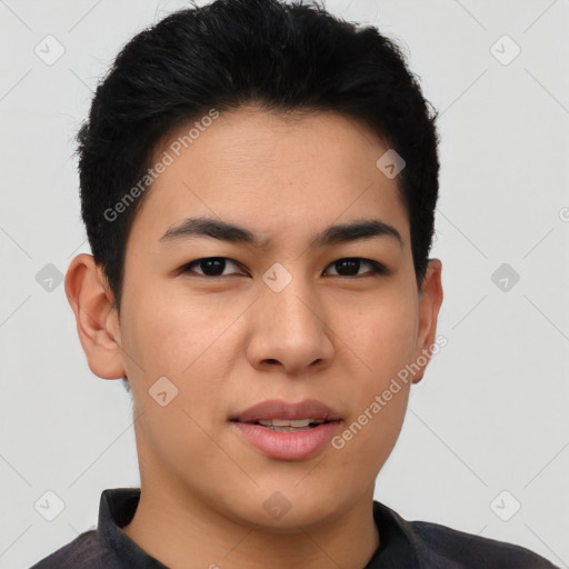 Joyful asian young-adult male with short  black hair and brown eyes