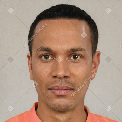 Neutral latino young-adult male with short  black hair and brown eyes