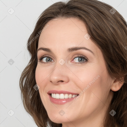 Joyful white young-adult female with medium  brown hair and green eyes