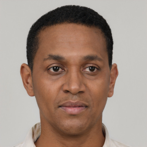 Neutral black adult male with short  black hair and brown eyes