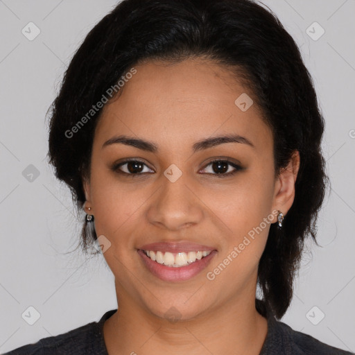 Joyful latino young-adult female with medium  brown hair and brown eyes