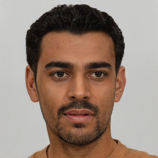 Neutral white young-adult male with short  black hair and brown eyes