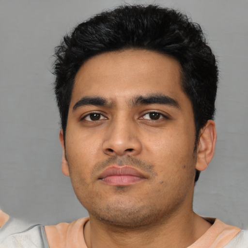 Neutral latino young-adult male with short  black hair and brown eyes