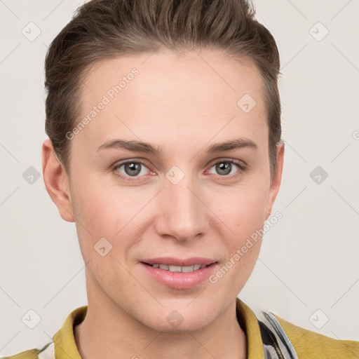 Joyful white young-adult female with short  brown hair and grey eyes