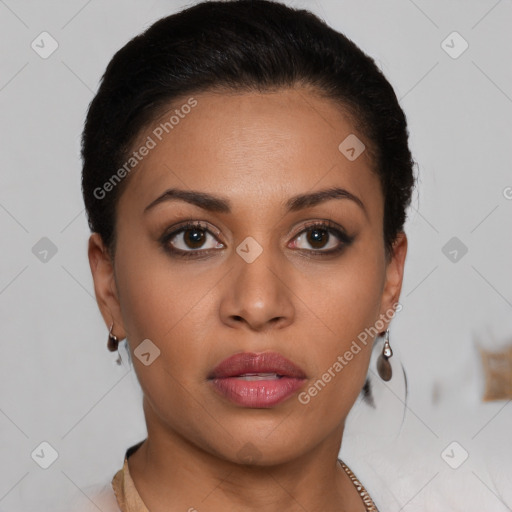 Joyful latino young-adult female with short  brown hair and brown eyes