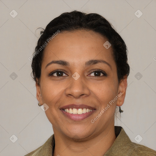 Joyful latino young-adult female with short  brown hair and brown eyes