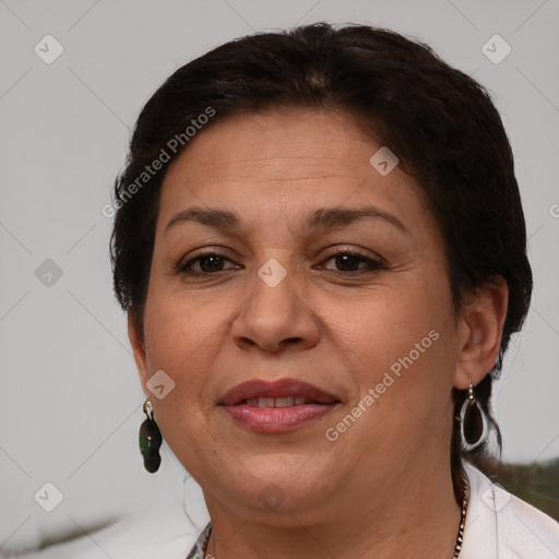 Joyful white adult female with short  brown hair and brown eyes