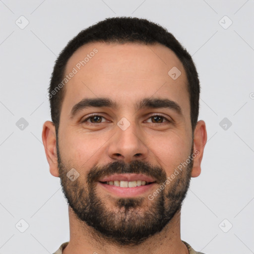 Joyful white young-adult male with short  black hair and brown eyes