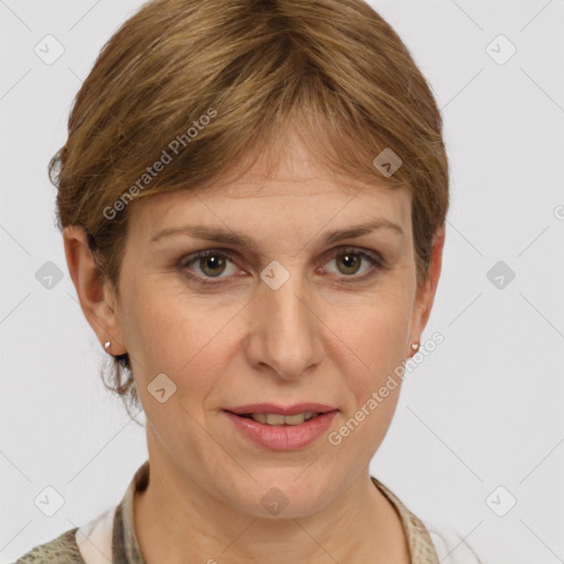 Joyful white adult female with medium  brown hair and grey eyes