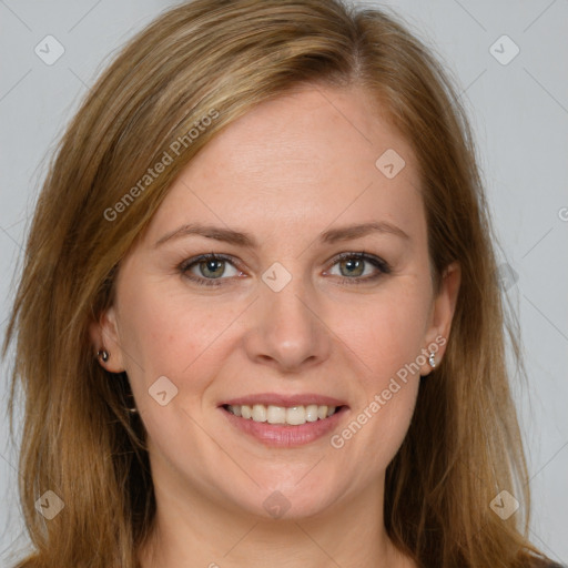 Joyful white young-adult female with long  brown hair and blue eyes