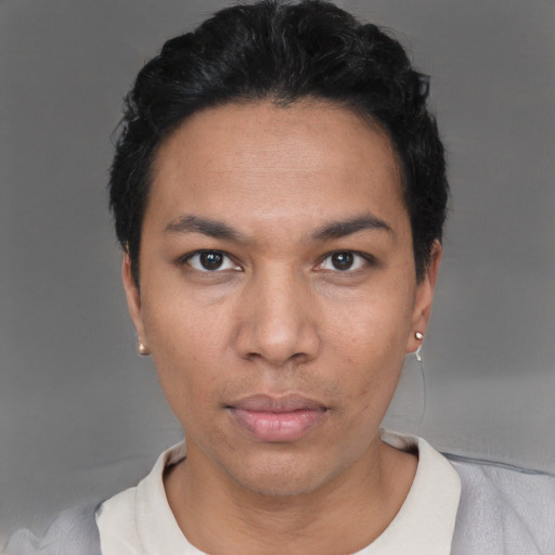 Neutral white young-adult female with short  black hair and brown eyes