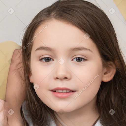 Joyful white child female with medium  brown hair and brown eyes