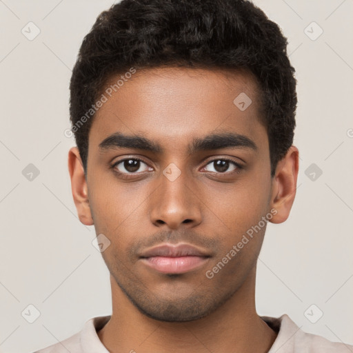 Neutral black young-adult male with short  brown hair and brown eyes