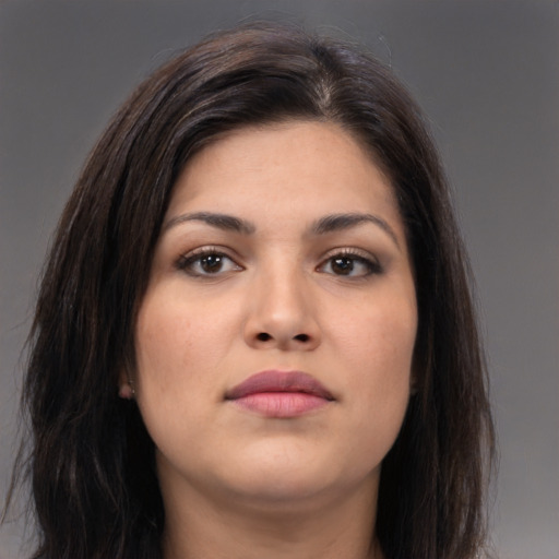 Joyful asian young-adult female with long  brown hair and brown eyes