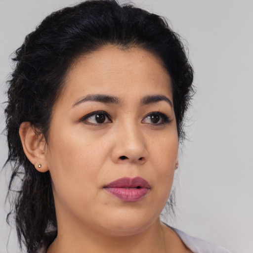 Neutral latino young-adult female with medium  black hair and brown eyes