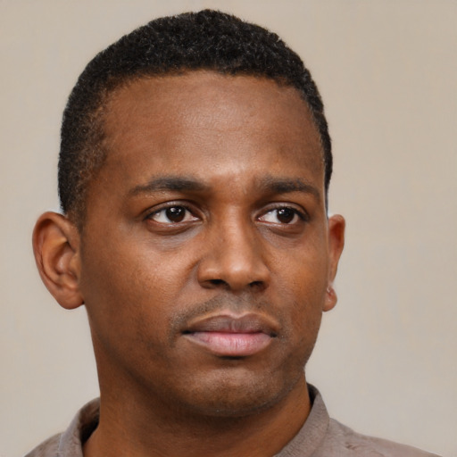 Neutral black young-adult male with short  brown hair and brown eyes