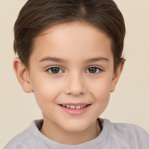 Joyful white child female with short  brown hair and brown eyes