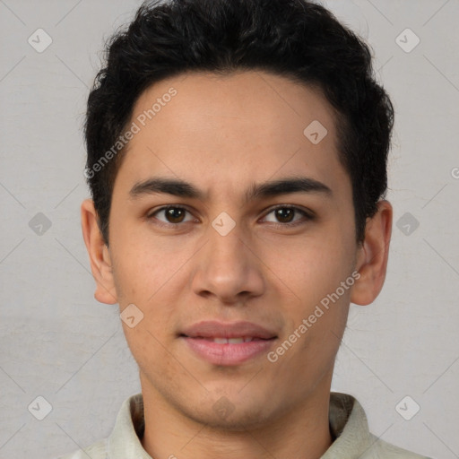 Joyful latino young-adult male with short  brown hair and brown eyes