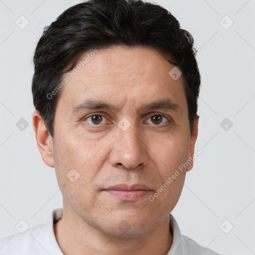 Neutral white adult male with short  brown hair and brown eyes