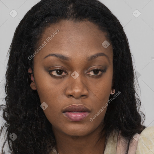 Neutral black young-adult female with long  brown hair and brown eyes