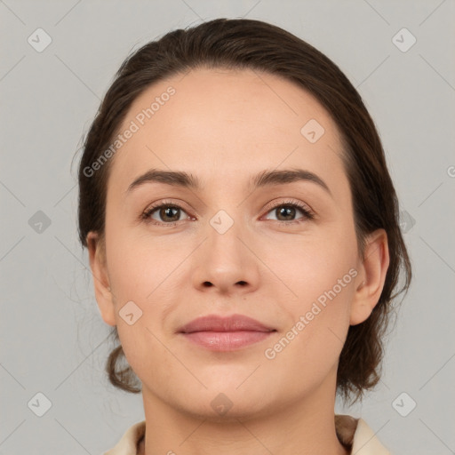 Joyful white young-adult female with medium  brown hair and brown eyes