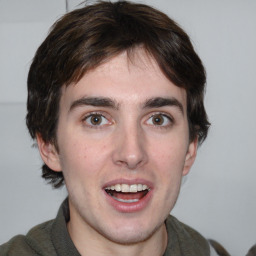 Joyful white young-adult male with medium  brown hair and brown eyes