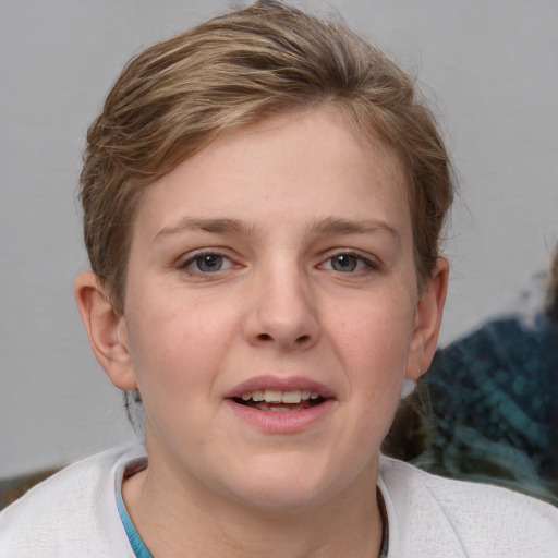 Joyful white young-adult female with medium  brown hair and blue eyes