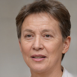 Joyful white middle-aged female with short  brown hair and brown eyes