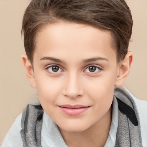 Joyful white child female with short  brown hair and brown eyes