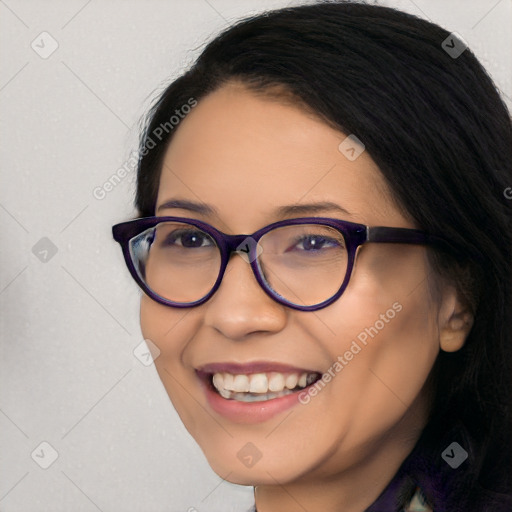 Joyful latino young-adult female with long  black hair and brown eyes