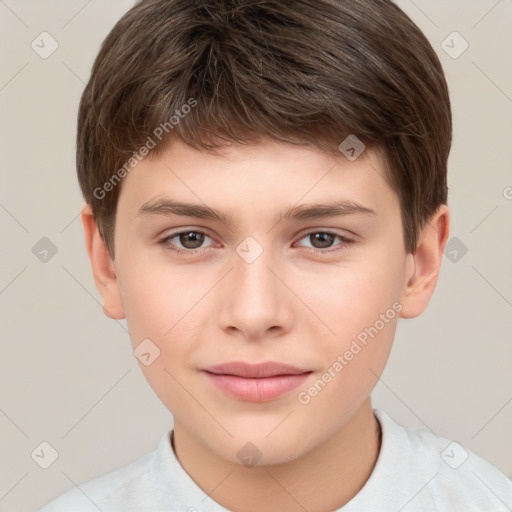 Joyful white child male with short  brown hair and brown eyes