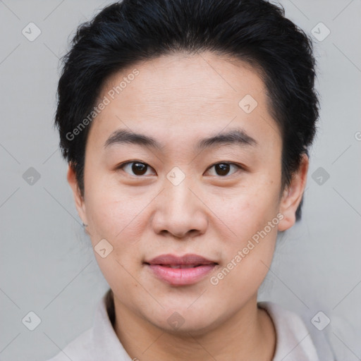 Joyful asian young-adult female with short  brown hair and brown eyes