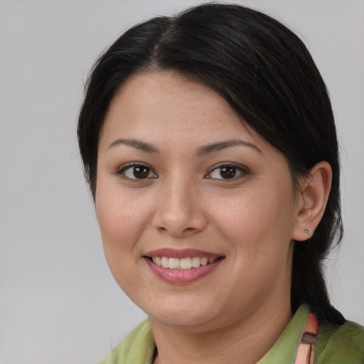 Joyful white young-adult female with medium  brown hair and brown eyes