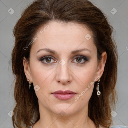 Joyful white young-adult female with medium  brown hair and green eyes