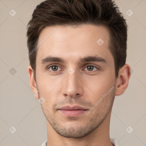 Neutral white young-adult male with short  brown hair and brown eyes