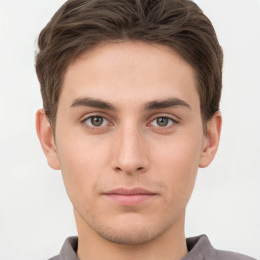 Neutral white young-adult male with short  brown hair and brown eyes