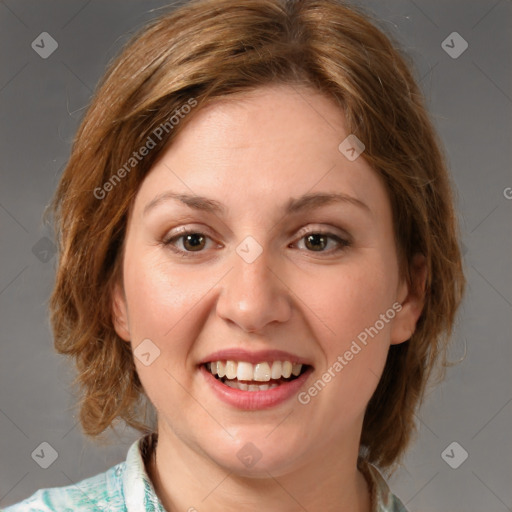 Joyful white young-adult female with medium  brown hair and green eyes