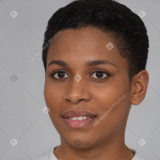 Joyful black young-adult female with short  brown hair and brown eyes