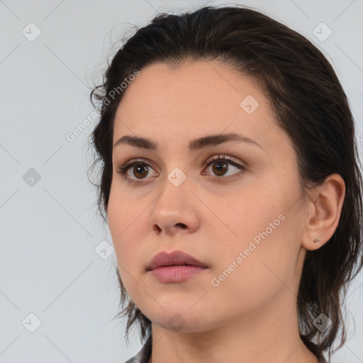 Neutral white young-adult female with medium  brown hair and brown eyes