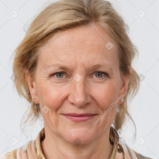 Joyful white adult female with medium  brown hair and blue eyes