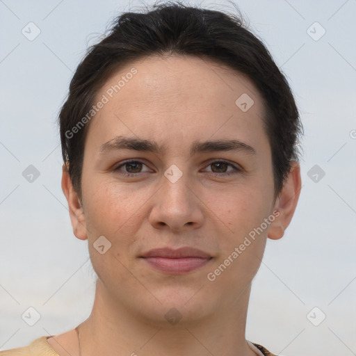 Joyful white young-adult female with short  brown hair and brown eyes