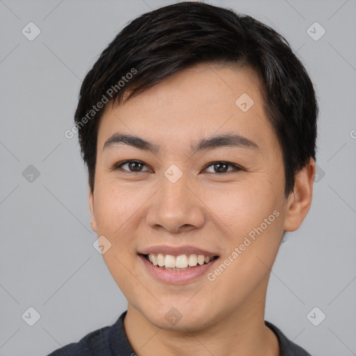 Joyful asian young-adult male with short  black hair and brown eyes