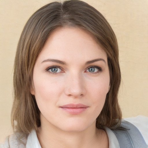 Neutral white young-adult female with medium  brown hair and blue eyes