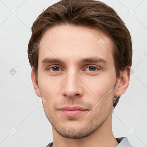 Neutral white young-adult male with short  brown hair and grey eyes