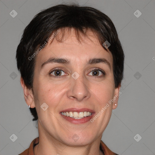 Joyful white adult female with short  brown hair and brown eyes