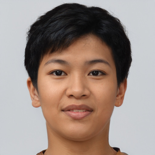 Joyful asian young-adult female with short  black hair and brown eyes
