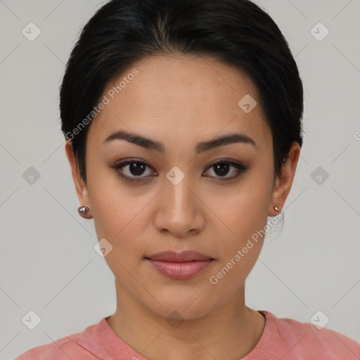 Joyful asian young-adult female with short  black hair and brown eyes