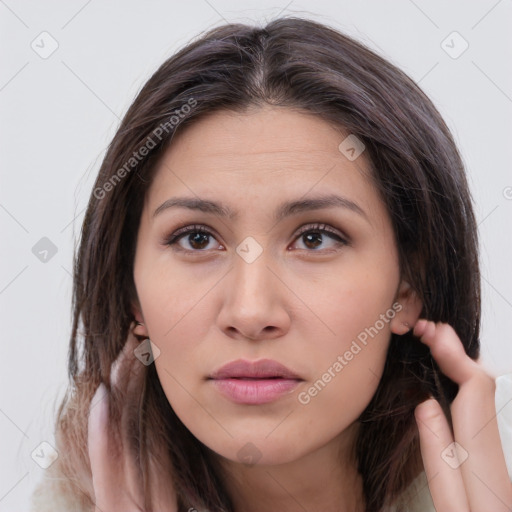 Neutral white young-adult female with medium  brown hair and brown eyes